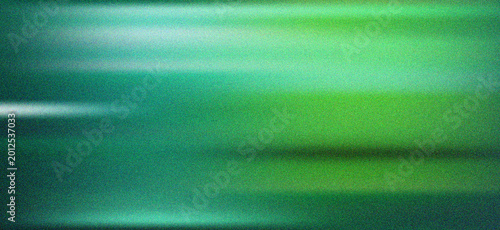 Green abstract motion blur background with smooth glow and grainy texture