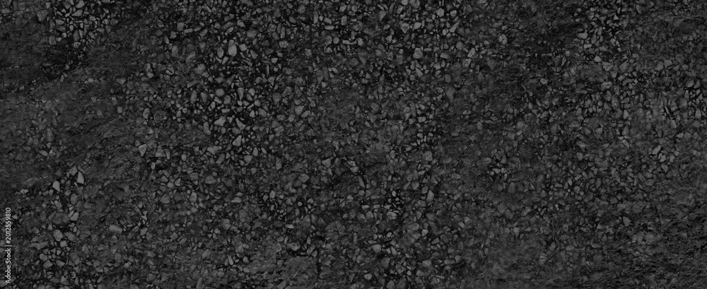 Fototapeta premium Textured pebbles background in black concrete