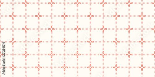 Hand drawn cross stitch pattern in pink and cream with a seamless grid design.