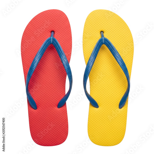 Colorful red and yellow flip-flops isolated on a transparent background. Symbolize summer, beachwear, casual style, and vacation essentials