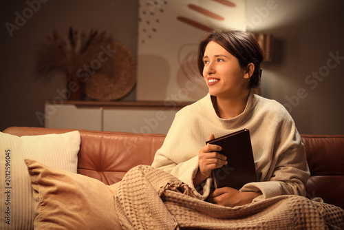 Young happy woman with soft...