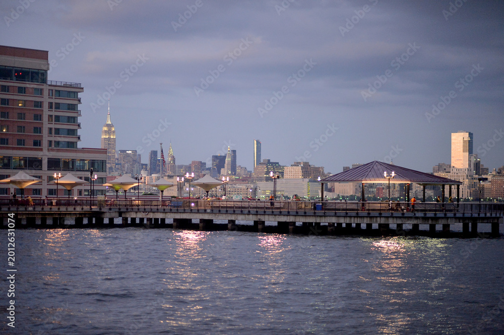 Fototapeta premium Twilight Port With Water Reflections. Sunset Harbor View With Boats And Lights new york