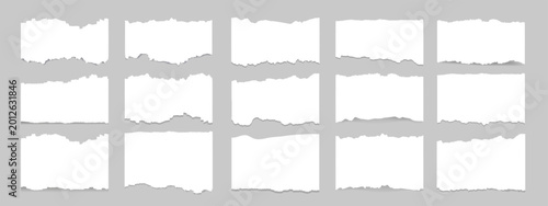 Photos Set of white torn paper strips with uneven, rough edges on gray background