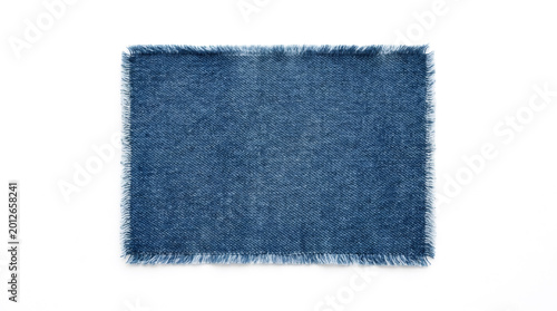 Frayed rectangular blue denim patch with raw edges, isolated on a white background, ideal for fashion and textile design concepts.