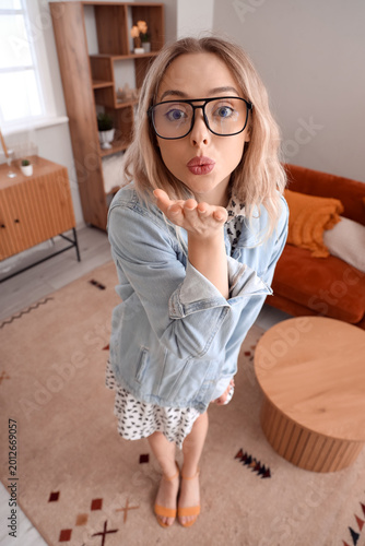 Young woman in stylish eyeg...