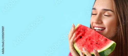 Young woman eating fresh wa...