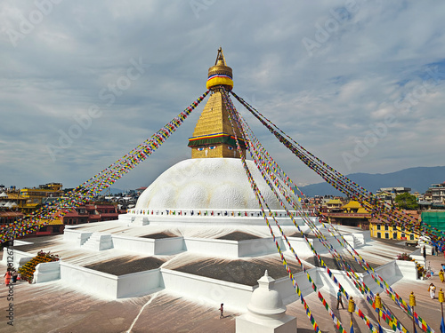 Kathmandu, Nepal - October 27, 2025: Swayambhunath Stupa in Kathmandu adorned with colorful prayer flags, showcasing rich cultural heritage and spiritual significance in Nepal