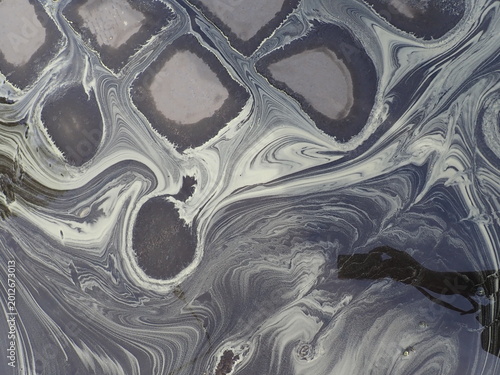 dust ans oil stain on water pound