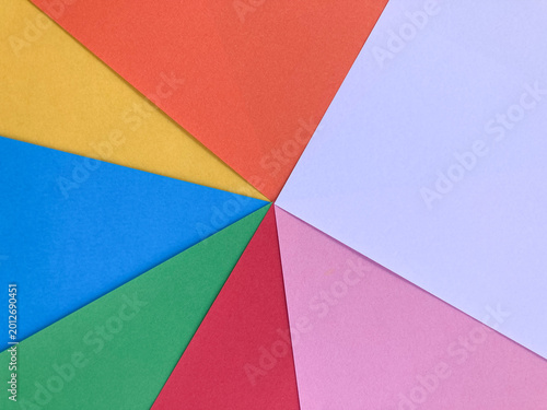 Color paper sheet arranged to show geometry shape. Top view. Paper craft color geometry