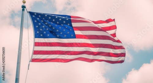 American independence day flag waving in the wind on a patriotic background
