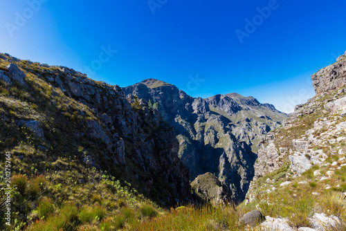 An amazing view on a perfect day over the Jonkershoek Nature Reserve located close to Stellenbosch in South Africa and home to the Jonkershoek Mountains and the impressiv valley. The reserve includes 
