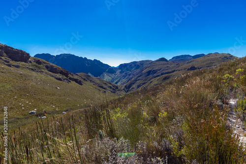 An amazing view on a perfect day over the Jonkershoek Nature Reserve located close to Stellenbosch in South Africa and home to the Jonkershoek Mountains and the impressiv valley. The reserve includes 