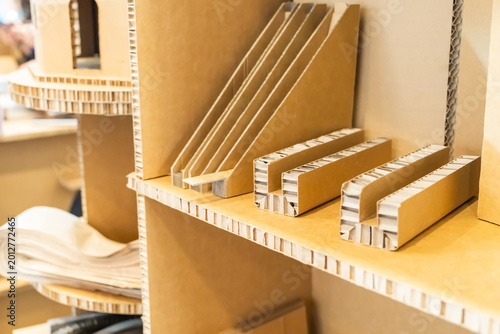 Фотография house furniture made with cardboard. Artistic product handicraft