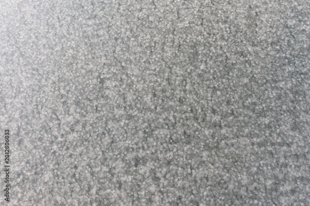 Fototapeta premium Texture of a frozen lake surface.