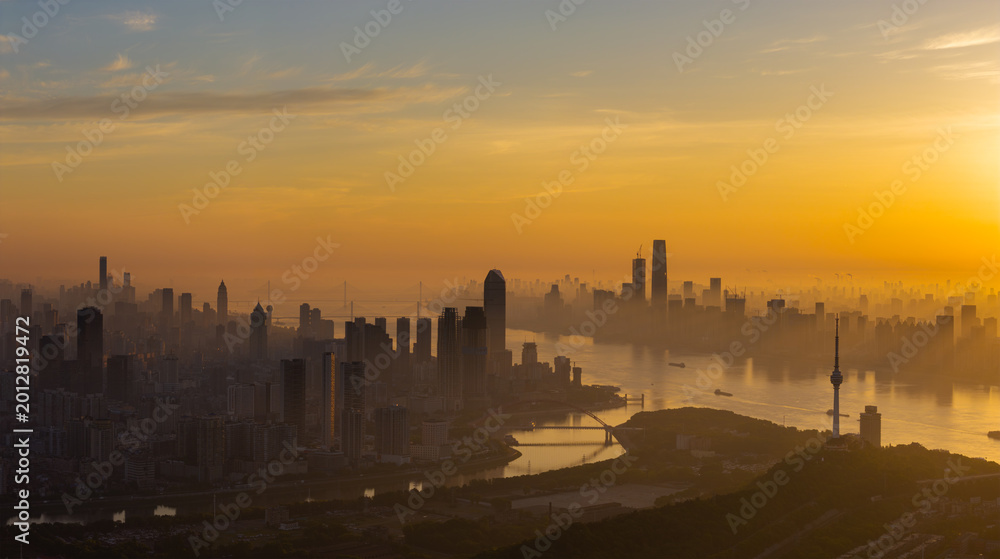 Naklejka premium Sunrise over the skyline of Wuhan, Hubei, China