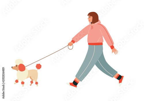 Young woman walking a poodle on a leash, girl in tracksuit with her dog isolated on white background, pet owner lifestyle