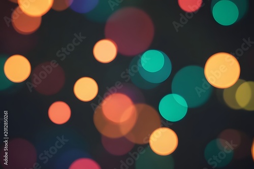 Bokeh lights in warm and cool tones during a festive celebration creating a magical atmosphere for design backgrounds