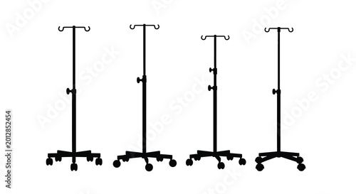 Foto Medical iv stands in a row black silhouette
