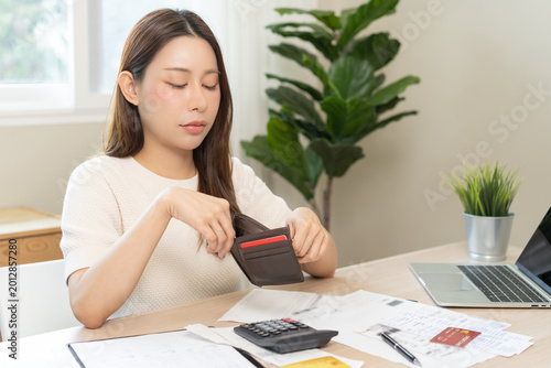 Schilderij op canvas Debt financial concept, stressed problem asian woman hand open empty wallet, purse not have budget of money to pay no have credit card, not able payment bill, loan or expense with bank, bankruptcy