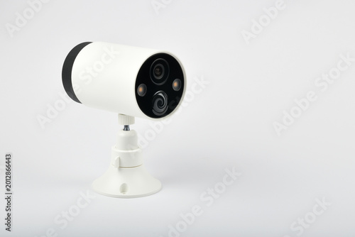 Close up view of white smart wire free security camera isolated on white background
