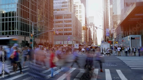 people walking in the city during rush hour traffic