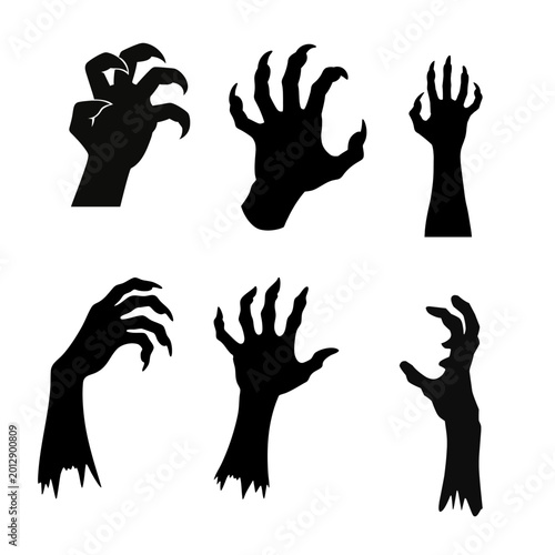Photos A collection of dark, creepy zombie hand silhouettes reaching up