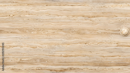 Beige travertine stone slab texture with polished pebble detail