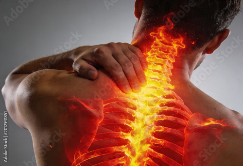 Man experiencing severe neck and upper back pain with fiery inflammation along spine anatomy medical.