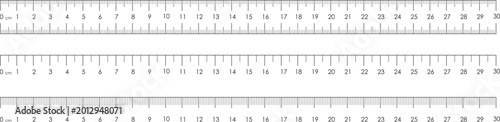 Konstfotografi A set of professional measuring tools featuring a metal ruler and tape with metr