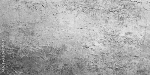 Fotografie Textured Stone Surface: A close-up view reveals a rugged stone texture, its surface etched with the passage of time and the forces of nature, exuding a sense of enduring strength and timeless beauty