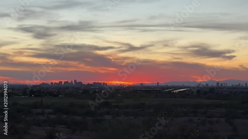 Phoenix, Arizona Skyline Sunset Footage with Dramatic Evening Sky and Urban Silhouette Landscape