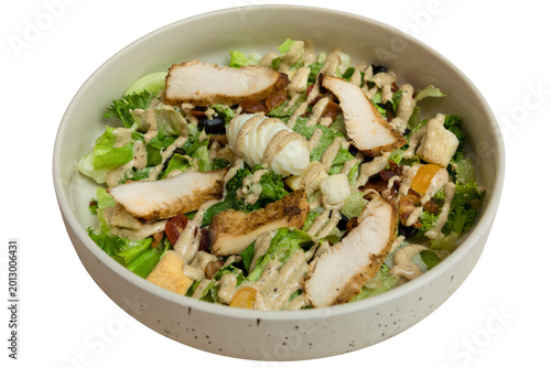 Grilled chicken breast Caesar salad with crispy bacon, fresh and healthy dish with appetizing presentation, rich creamy dressing and vibrant ingredients, isolated on transparent background, PNG file
