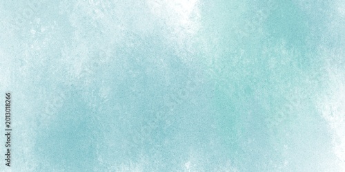 紙テクスチャに水色の水彩で描かれた、かわいいグランジ背景
