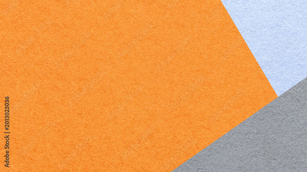 Fototapeta premium Orange textured paper background with light blue gray triangular corners and copy space. Template for presentation, banner