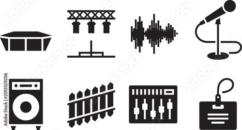 Foto Stage lighting speaker audio waveform microphone fence mixing console and badge