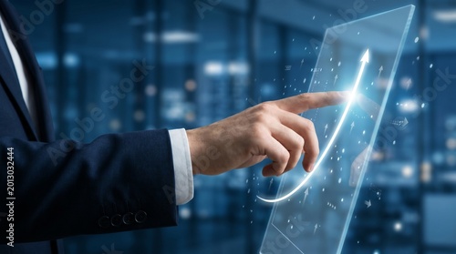 Businessman interacting with a futuristic digital screen showing an upward
