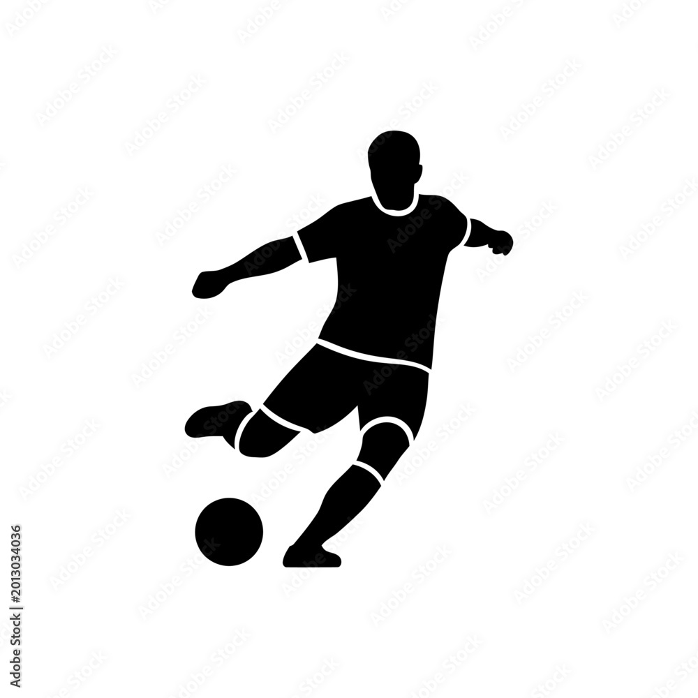 Fototapeta premium Silhouette of Soccer Player Kicking Ball in Action