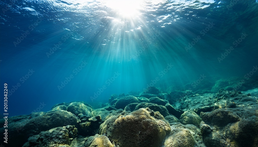 Obraz premium underwater ocean serenity sunrays and natural reflections in the aquatic depths