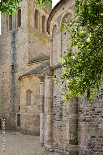 Roman chevet of the Caunes-Minervois abbey with its typical stones