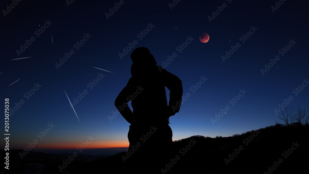 Fototapeta premium Amateur astronomer observing stars, planets, Moon eclipse and other celestial objects.