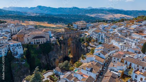 Foto Aerial photograph of a bridge and streets, facades of old houses in a town in Sp