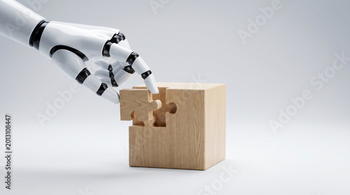 Robotic hand placing puzzle piece into wooden block on white background  