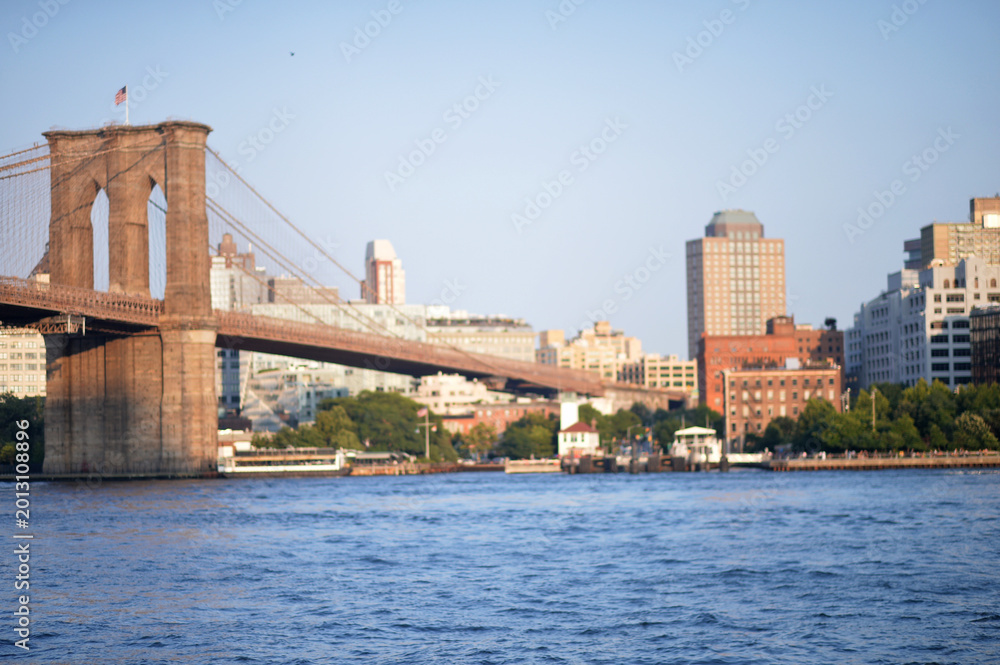 Fototapeta premium Serene Cityscape Scene. Peaceful Urban Sunset Featuring Stone Arches And Gentle Water new york