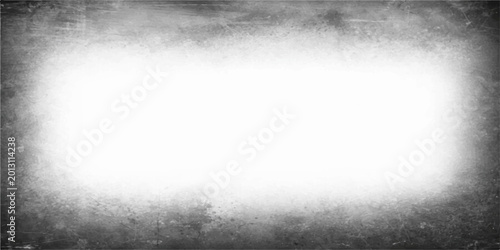 Fotografie A dark abstract grunge background features a rough grey stone wall texture frame