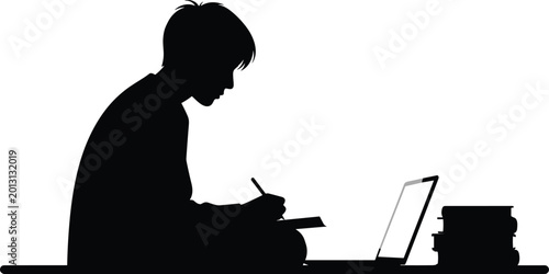 Silhouette student sitting at desk writing notes with laptop and books symbolizing study, education, learning and productivity