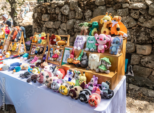 Various knitted handmade toys for sale at annual Jerusalem Knights festival in Jerusalem in Israel