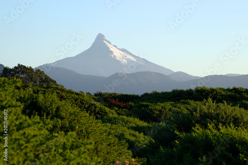 Obraz na plátne Corcovado volcano seen from Chaitén beach at sunset with a foreground of bright