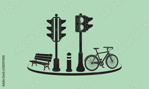 Traffic lights bicycle bench bollard on street with traffic signa