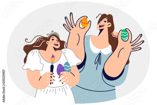 Canvastavla Mom and daughter decorate easter eggs, preparing for orthodox holiday, and hold