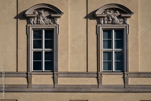 Photos Classical twin windows with ornate pediments